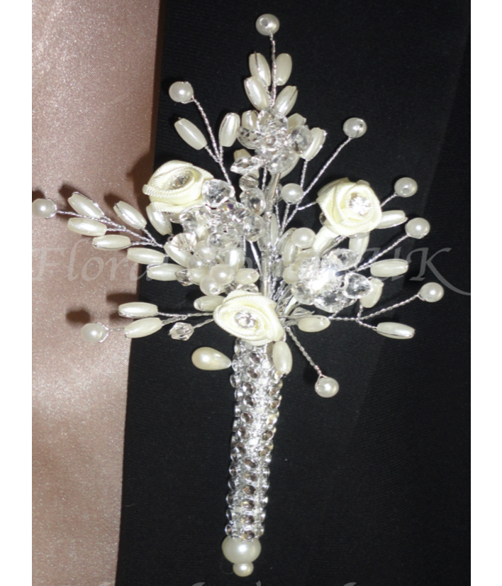 Designer corsage for weddings, mini diamnate ribbon roses with seeded pearl sprays and faux diamate wrap
